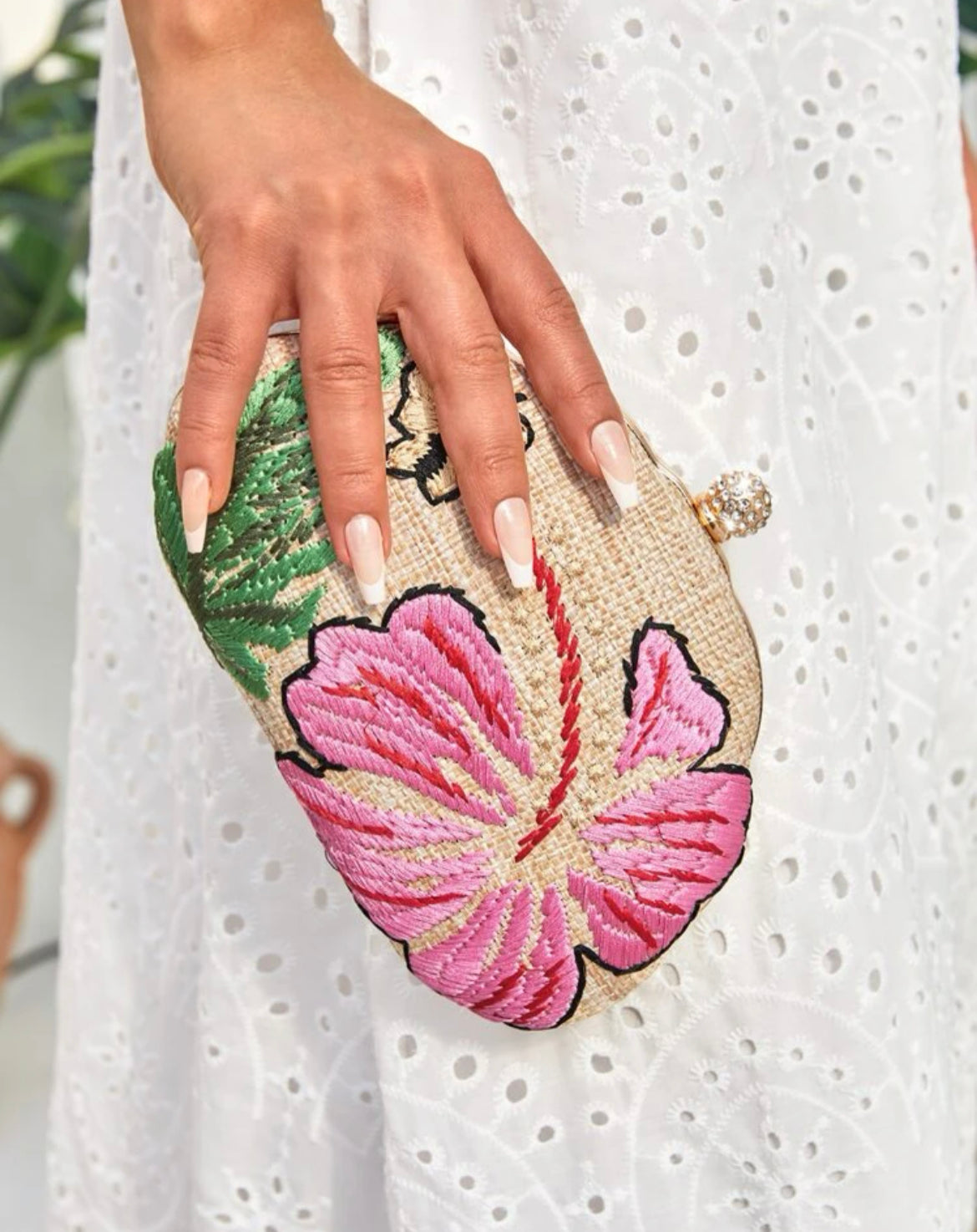 Cartera flor ovalada