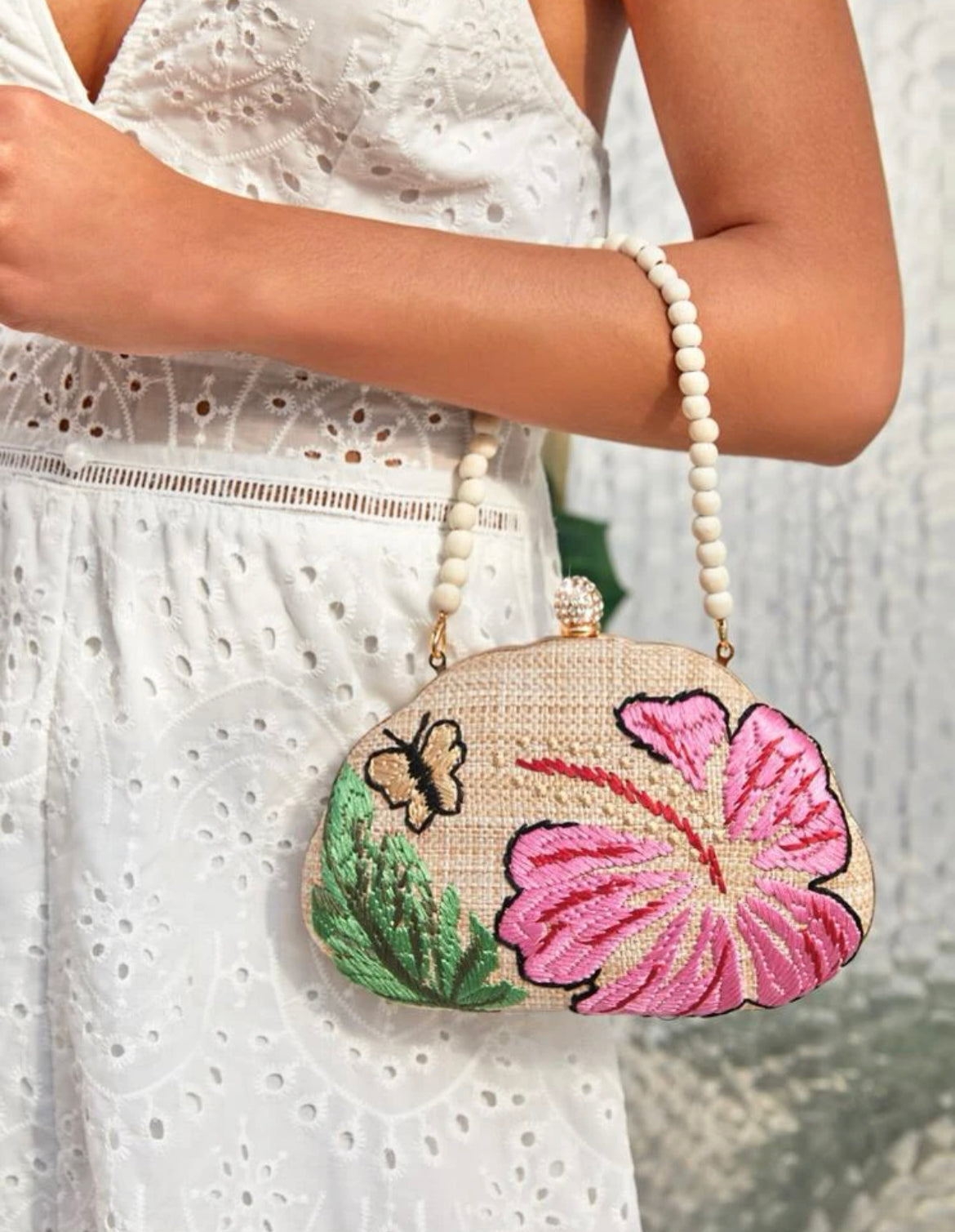 Cartera flor ovalada